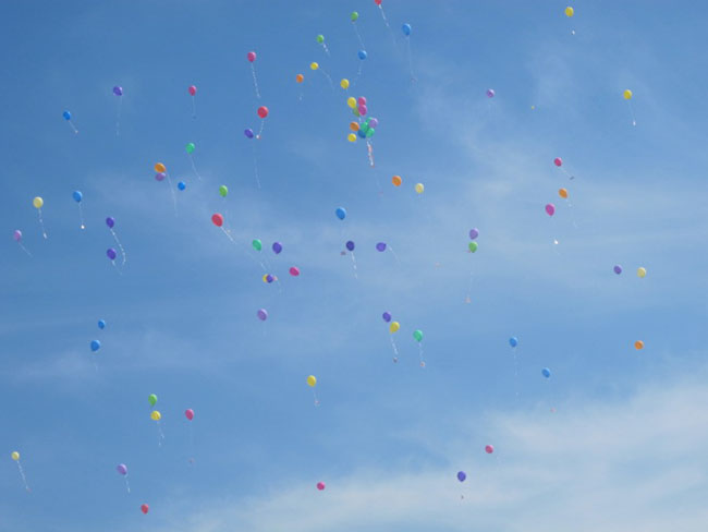 Balloons released at the Brenda Sanchez memorial.
