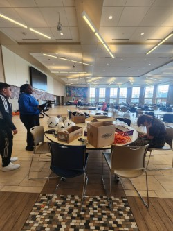 Joliet Central JROTC Program cadets decorating for the Halloween party.
