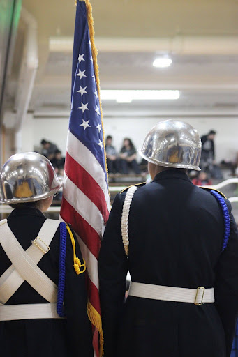 Joliet Central’s JROTC members standing for representation in the Spring Pep Sports Assembly to start off the event. 